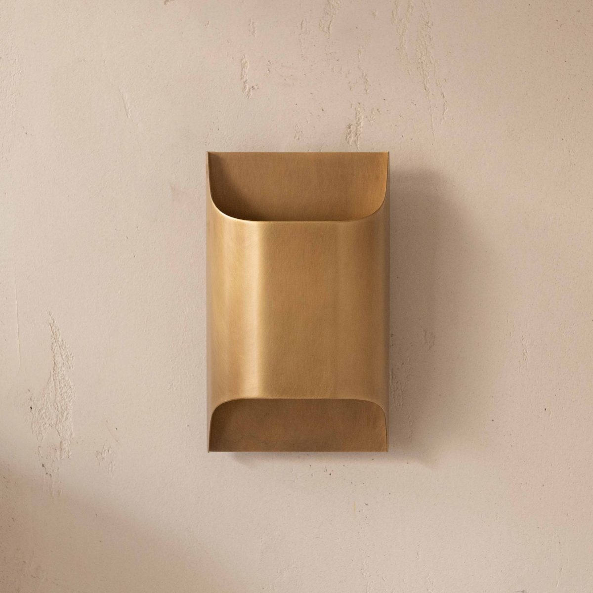 Aplique de latón envejecido